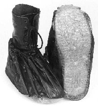 Shoe covers on a pair of boots